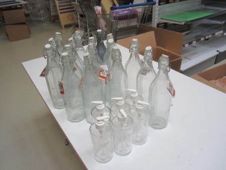 Approximately 35 paragraph patent bottles of 1 liter and 6 soap dispenser