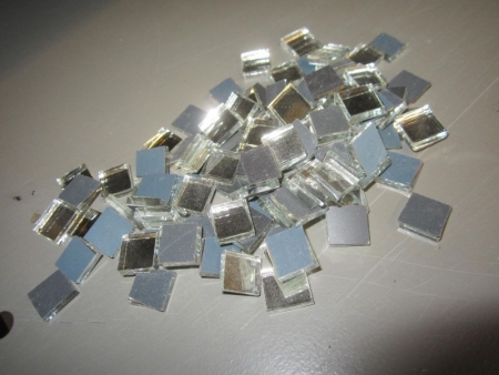 Mirror stained glass 10x10 mm in bags of 100 units, totaling about 1,200 bags