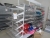 3 subjects dobbetsidet store shelf, Expedit Basic 2, about 90xdybde 2x50x height 235 cm, white with black fodfri, with gable shelves at one gable and wire shelves, partitions mm chrome content on shelves not included