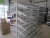 2 subjects store shelves on wheels, double-sided, approximately 180x100xh180 cm, white and with wire shelves in chrome and white