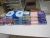 14 Pakete farbigen Kopierpapier A4 + 8 Pakete farbigen Kopierpapier in A3, in zwei Kartons verpackt