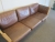 Leather sofa in beech with 3 seats, in brown leather, one seat cushion MISSING