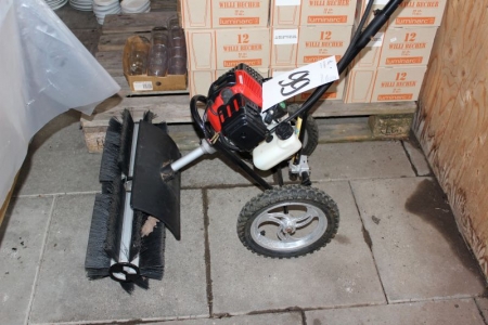 Petrol-powered sweeper