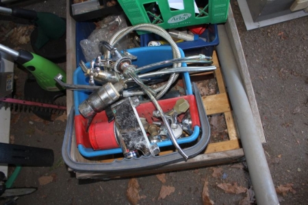 Pallet with various plumbing supplies
