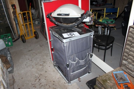 Camping storage box + Weber gas grill + microwave