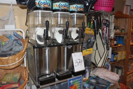 Slushice machine with 3 vessels. Remains of juice in cans include bæåbær, cola and raspberry