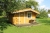 Log cabin with terrace. (2) Furnished with kitchen table with cabinets, bunk bed, sofa, dining table with four chairs. Dimensions: B: 4200 - D 3600 mm - H: 2000 (pages) by 50 cm overhang the sides. Height to tilt 2550 mm, 'Terrace: 1800 x 4200 mm overhang