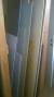 Content in vertical bookcase door + cement, waterproof plywood (most residues)