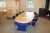 Magnus Olesen Conference table with 10 matching chairs, blue fabric.