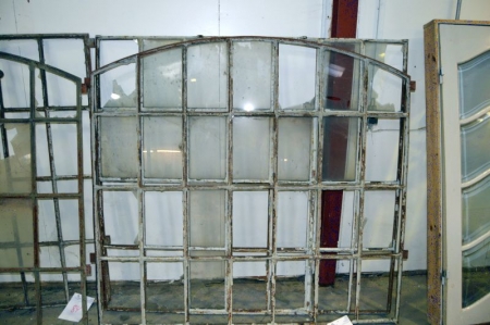 wrought iron window with curved top. Wxh: ca. 190 x 178 cm + wrought iron window Wxh: 190 x 178 cm
