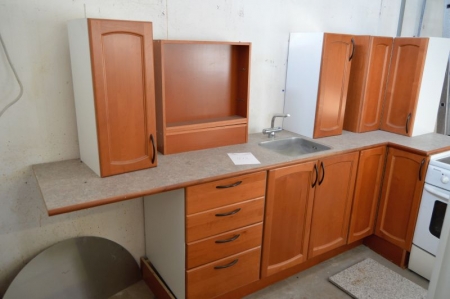 Taken down kitchen with sink and faucet. Finish not specified, but looks like cherry