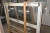 Tür, Holz-Alu, mit Seiten- und Bodenstück. Rahmenabmessungen, B x H, ca. 137,5 x 218 mm