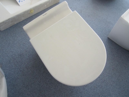 White toilet for wall Duravit, with seat and soft closing, unused