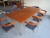 Rumas meeting table in cherry, chrome steel, five legs in total, 200x100 cm, with 8 chairs Cinus in cherry / chrome with polsterryg, design: Troels Grum-Schwensen. The chairs are stackable. Everything is in good and fair condition. Includes crocheted tabl