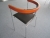 Stol Cinus fra Rumas, i kirsebær/chrom med sort læderpolstring på sæde og ryg, design: Troels Grum-Schwensen. Stolen er i flot stand