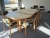 Mødebord i bøg og hvid laminat cirka 270x138 cm (2 småbeslag mangler til pladen MANGLER) samt 11 stk Farstrup  formspændte stole i bøg med blå betræk