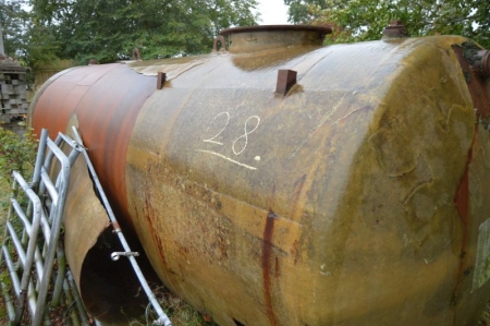 Glass fiber coated oil tank. However, glass fiber is partially peeled off. Approximately 7000 liters
