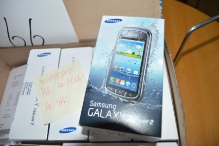 Mobile phone, Samsung S7710 Galaxy Xcover 2 Titan Grey. Unused in original packaging. Archive photo