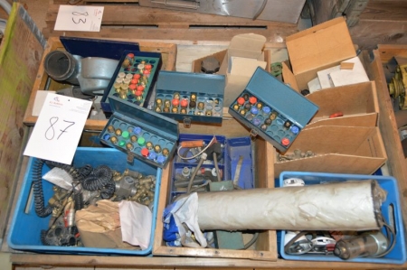 Pallet with various plumbing parts, including oil nozzles, gate valves, fans and thermostats
