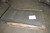 Pallet with various outtakes, steel. Thickness approx 5 mm