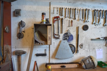 Content on the wall: miscellaneous hand tools etc.