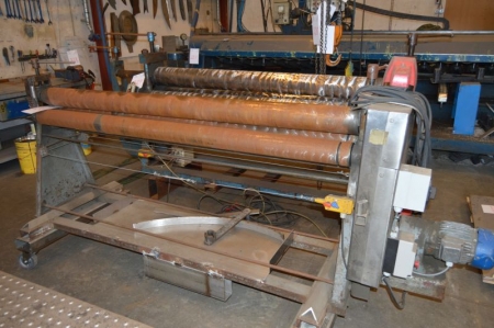 Sheet rolling mill, with 3 rollers. Working width approx 190 cm. Attached emergency stop. Without manufacturer, type and vintage