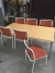  Canteen table + 6 chairs with fabric back and seat. Archive picture