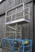 Foot-operated scissor lift, SDM type PL 324. Max. capacity: 225 kg. Max. lift height: 7.3 meters. Condition unknown