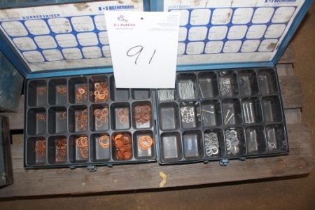 Assortment boxes containing copper rings etc.
