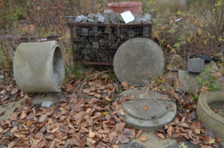 Round concrete pipes and covers the square