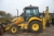 Backhoe Loader, New Holland B110.Year 2007. Power Shift, Command Control. 4-in-1 bucket. Beacon. Tires, too: about 10%, behind about 30%