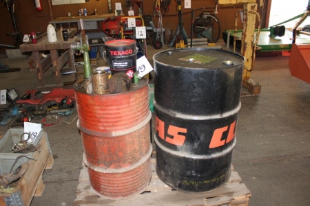 Barrel of oil (can be draining) + barrel with pump