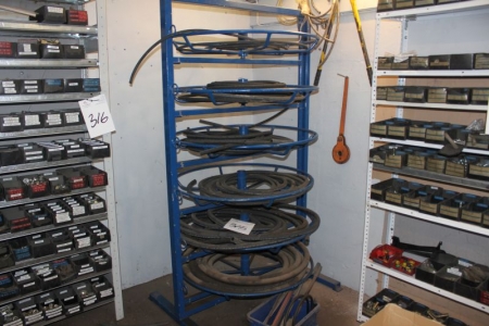 Hose Rack with hydraulic hoses + tools on the wall