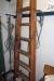 Everything in the corner: Ladder + shovels + miscellaneous tools + chair etc.