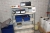 Steel Shelving with new and used batteries + jumper cables