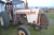 Tractor David Brown 1210. Frontweight. Missing door at both sides and window on the right. Fitted with tower lift without forks