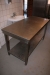 Rustfrit stål bord. Længde 140 cm., bredde 70 cm