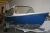 Fiberglass boat with 15HP outboard, marked Evinrude + boat trailer (OBS) trailer should not think of ownership.