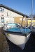 Dinghy / work boat with inboard. Length approximately 5.5 meters, width approximately 1.7 meters, engine Marstal gasoline engine with electric start.