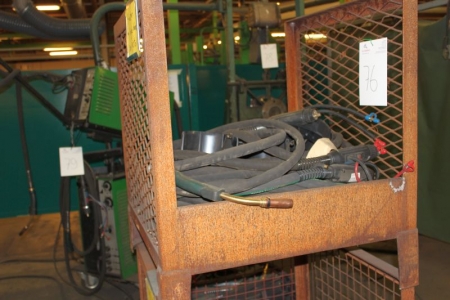 2 steel cages containing various welding cable and handles