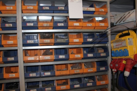 Shelving containing assortment boxes with discs + bolts + screws + nuts etc.