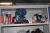Steel cabinet containing miscellaneous consumables + tools + welding helmets, etc.