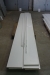 5 piece Chipboard shelves, ca. 4000 mm x 300 mm x 20 mm. Incl. Rails for wall mounting, but without shelf supports