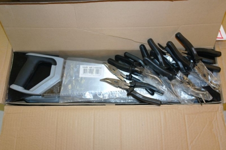 1 pack of 10 pcs. handsaws, 550 mm + approx 10 pcs tongs. Archive footage.