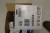 box with various printer cartridges.