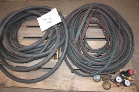 Pallet with Oxygen and gas hoses, air hoses, pressure gauges