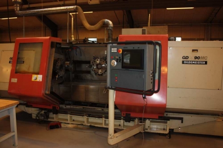 CNC vertical lathe, Gildemeister GDM 90 MC. Ø210x450. 4 axis. Twin Turrets with Driven Tools, Sub Spindle, Swarf Conveyor  Turning Dia 240 mm x Turning Length 850 mm. Speeds 20 - 4000 RPM. Year: 1990. SN: 48122. Control: Electropilot 20 CNC Control. Refur