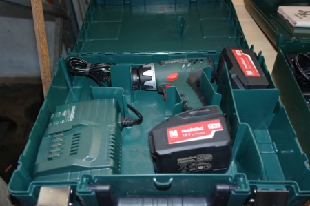 Cordless Drill, marked Metabo 18 volt, 3.0 Ah. Includes charger and two batteries. In unopened original packaging