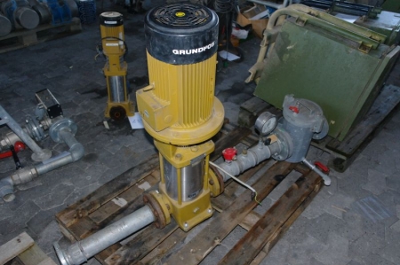 Pump, marked Grundfoss, with various accessories