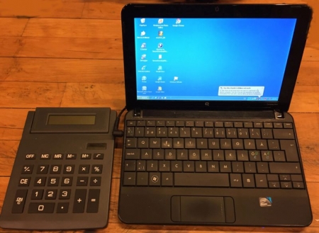 PC Compaq und Taschenrechner